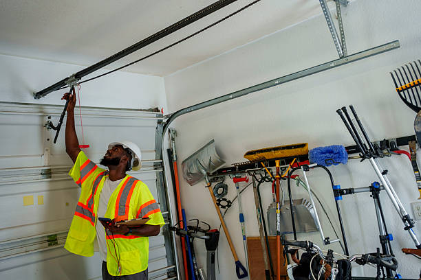 Professional Garage Door Roller Replacement technician working in Honeyville, UT